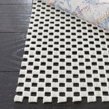 Padding Grid Pad  Power Loomed 15% Polyester, 85%  Pvc Foam Rug White