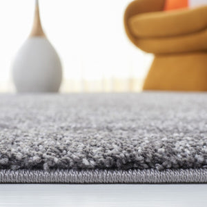 Safavieh Retro 560 Power Loomed 100% Polypropylene Solid & Tonal Rug RET560H-9