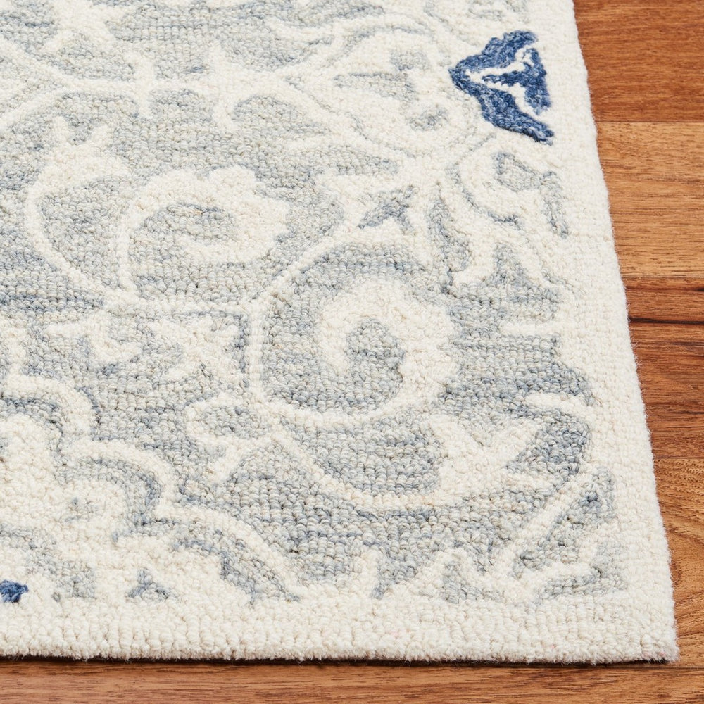 Roslyn 601  Hand Tufted 100% Wool Rug Ivory / Blue