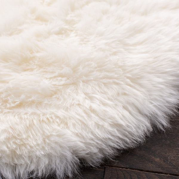 Safavieh Sheep Skin 121 Natural sheepskin made without dying 90% Jute/10% Cotton Rug SHS121A-1628