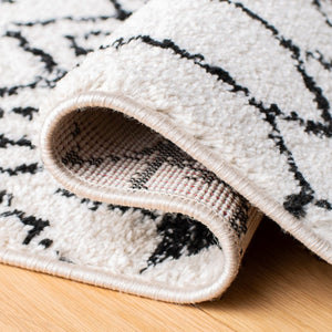 Tulum 229 Bohemian Power Loomed Polypropylene Pile Rug Ivory / Black