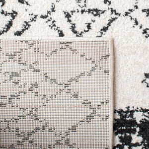 Tulum 229 Bohemian Power Loomed Polypropylene Pile Rug Ivory / Black