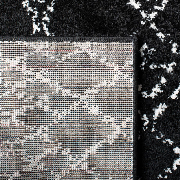 Tulum 229 Bohemian Power Loomed Polypropylene Pile Rug Black / Ivory