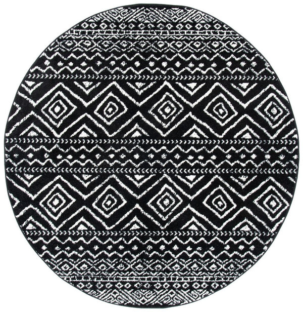 Tulum 267 Bohemian Power Loomed Polypropylene Pile Rug Black / Ivory