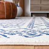 Tulum 268 Bohemian Power Loomed Polypropylene Pile Rug Ivory / Navy