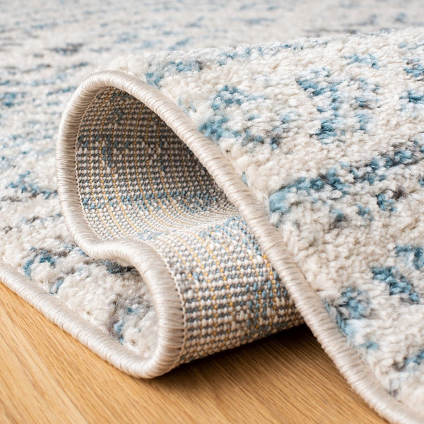 Tulum 272 Bohemian Power Loomed Polypropylene Pile Rug Ivory / Turquoise