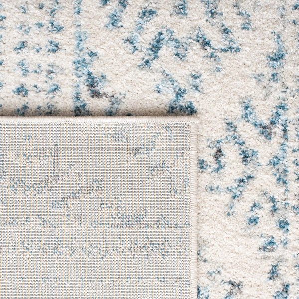 Tulum 272 Bohemian Power Loomed Polypropylene Pile Rug Ivory / Turquoise