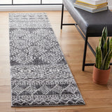 Tunisia 734 Bohemian Power Loomed 100 % Polyproplene Pile Rug Black / Ivory