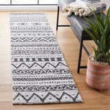 Tunisia 735 Bohemian Power Loomed 100 % Polyproplene Pile Rug Ivory / Black