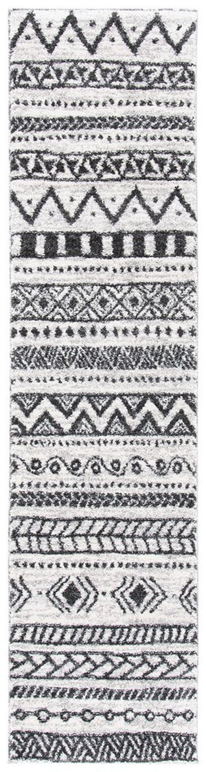 Tunisia 735 Bohemian Power Loomed 100 % Polyproplene Pile Rug Ivory / Black