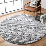 Tunisia 735 Bohemian Power Loomed 100 % Polyproplene Pile Rug Ivory / Black