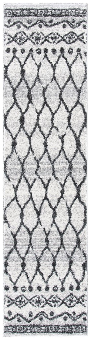 Tunisia 760 Bohemian Power Loomed 100 % Polyproplene Pile Rug Ivory / Black