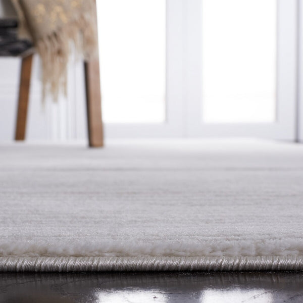 Safavieh Vision 606 Flat Weave 70% Polypropylene/30% Polyester Solid & Tonal Rug VSN606K-9